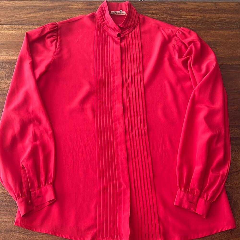 Beautiful red silk shirt with nice details at collar.Size 8 fits small to medium